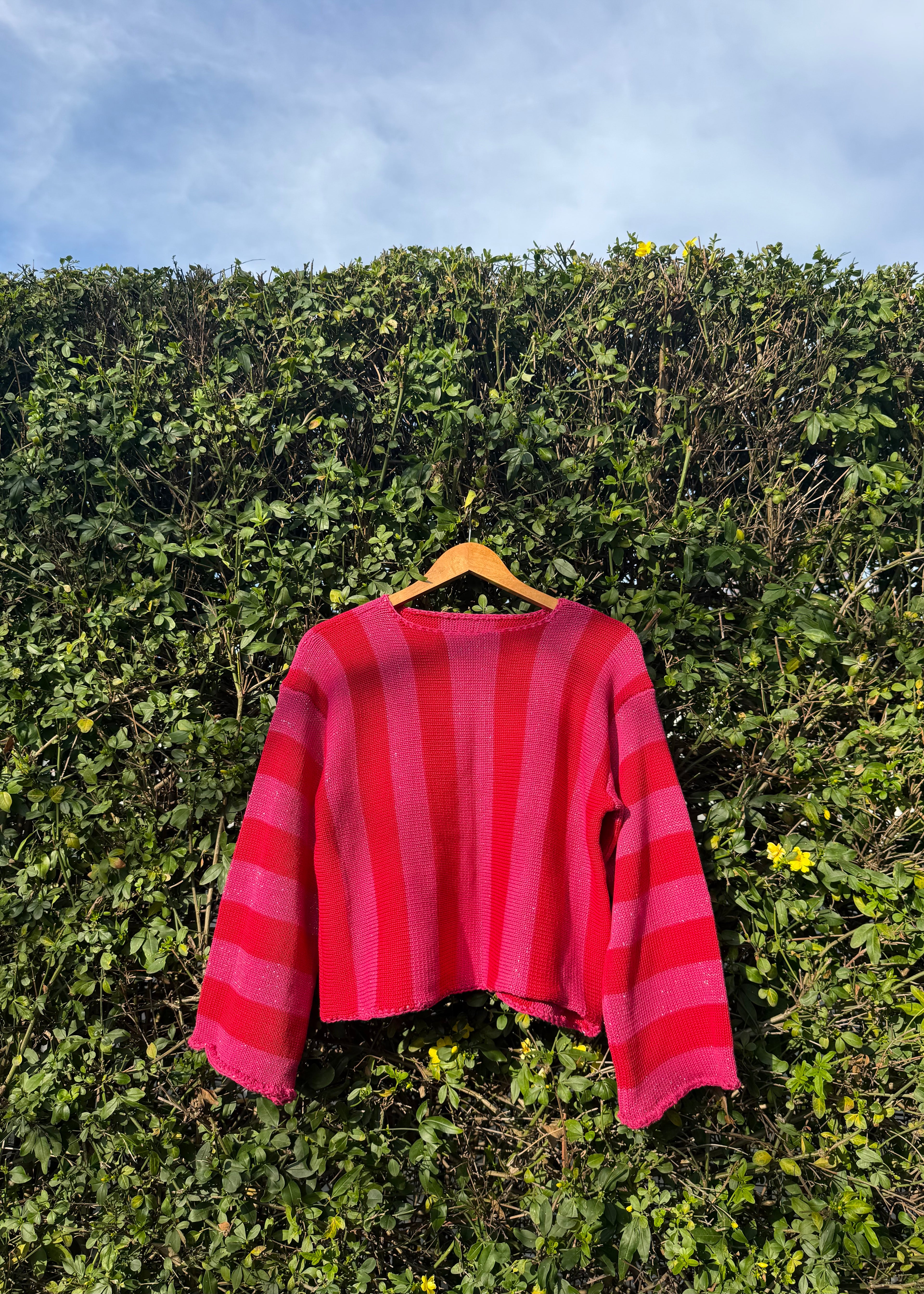 Sweater Versa Rojo con Fucsia